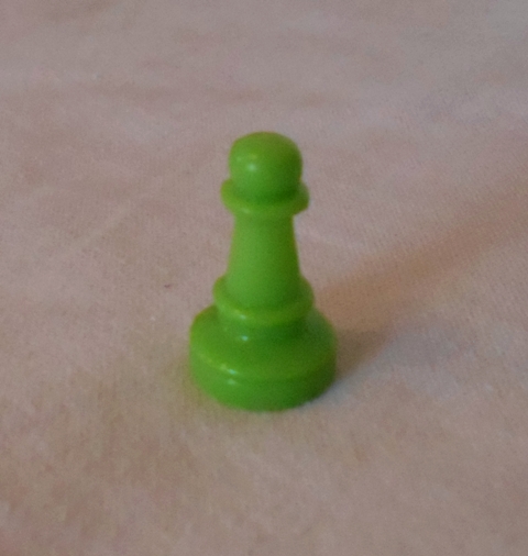 Hrací figurka plastová v zelené barvě, s osazeními